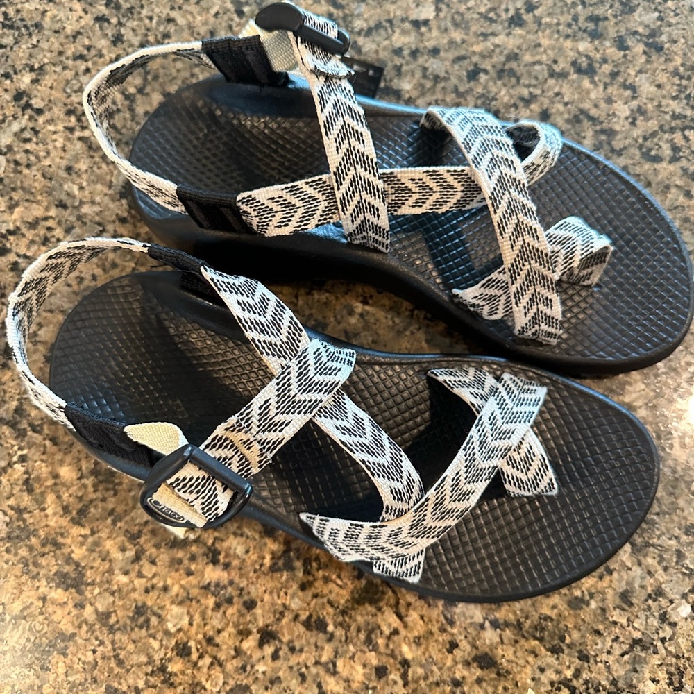 Lightly worn, women’s size 8 Chaco Z2 sandals with white and black straps